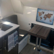 Inside the Adventure Truck is a kitchen, dining area and bedroom